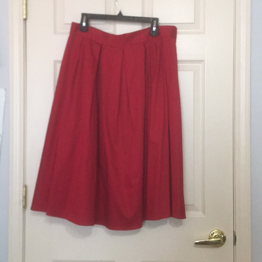 Red pleated midi skirt